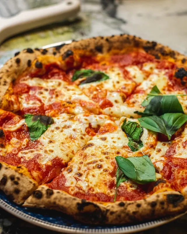 Signature Pasteria pizza in the hero section
